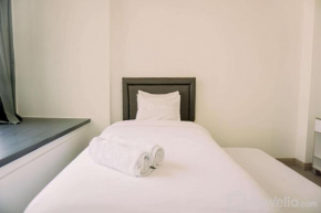 Homey and Comfy Studio Collins Boulevard Apartment By Travelio